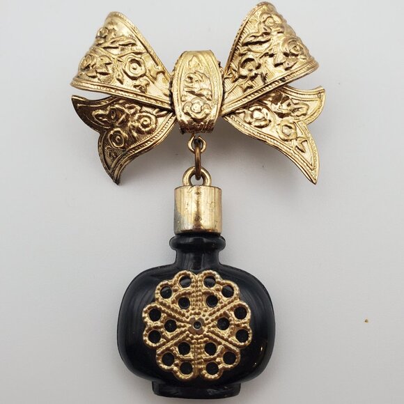 Vintage Ornate Gold Metal Bow w/ Dangling Black Glass Perfume Bottle Brooch Pin - Picture 1 of 6